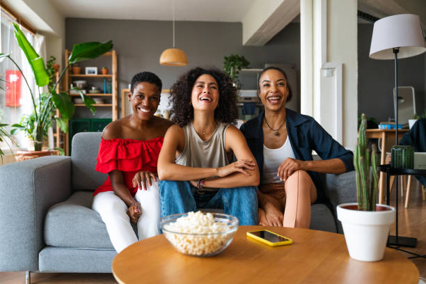 istock Three mixed race hispanic and black women bonding at home 1440934280