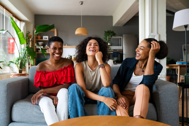 istock Three mixed race hispanic and black women bonding at home 1440934294