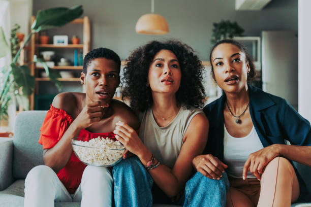 istock Three mixed race hispanic and black women bonding at home 1440934903