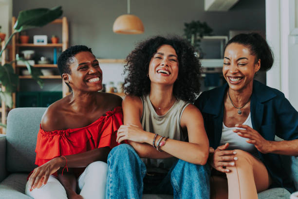 istock Three mixed race hispanic and black women bonding at home 1440934986