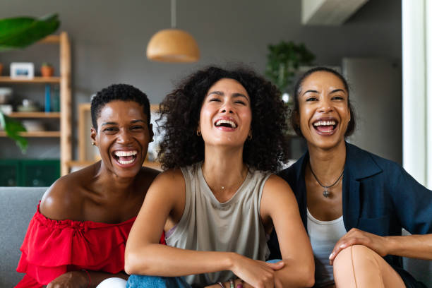 istock Three mixed race hispanic and black women bonding at home 1440935027