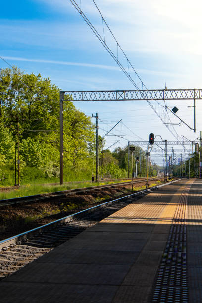 istock Railway station. The way forward railway for train. Empty Railway track for locomotive. Transportation system Nature background around. travel 1440935199