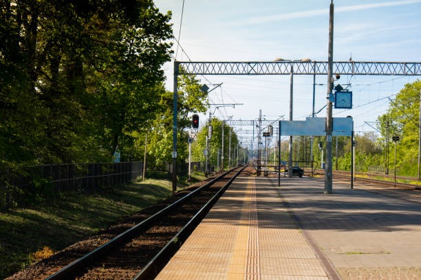 istock Railway station. The way forward railway for train. Empty Railway track for locomotive. Transportation system Nature background around. travel 1440935360