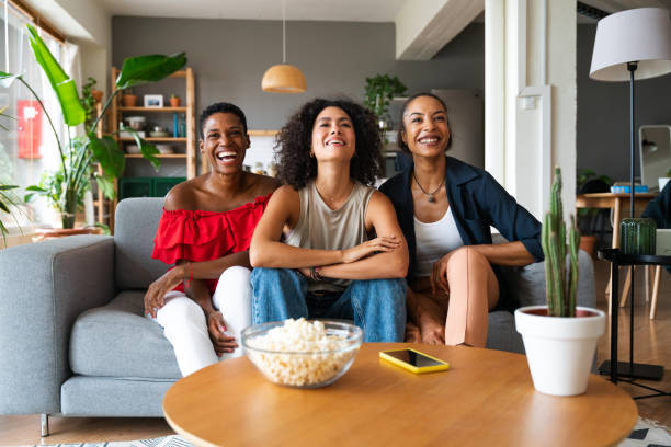 istock Three mixed race hispanic and black women bonding at home 1440935403