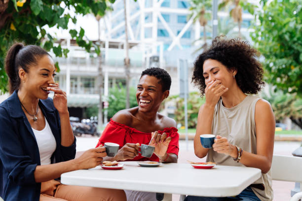 istock Three mixed race hispanic and black women bonding outdoors 1440935587