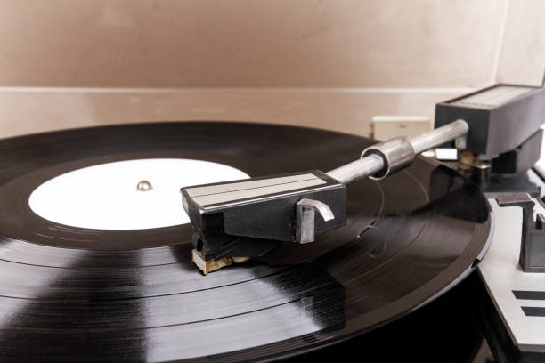 istock Close up of turntable needle on a vinyl 1440945406