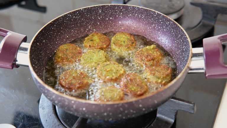 Homemade falafel deep-fried in hot oil to form a crust. Eastern vegetarian cuisine.