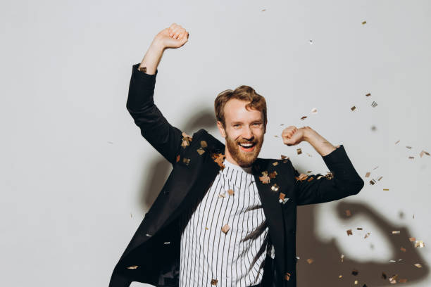 istock Young man dancing at a new year eve party 1440948823