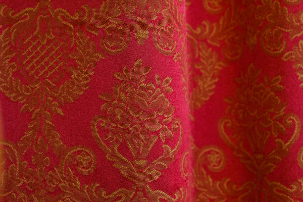 Close up of a noble red brocade curtain
