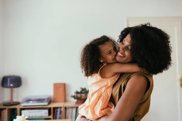istock Daughter Hugging Her Mother 1440949772