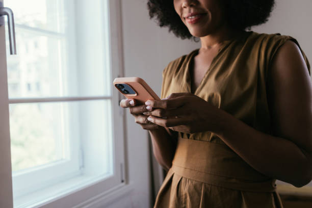 istock Woman Texting On Her Cell Phone Device 1440949802