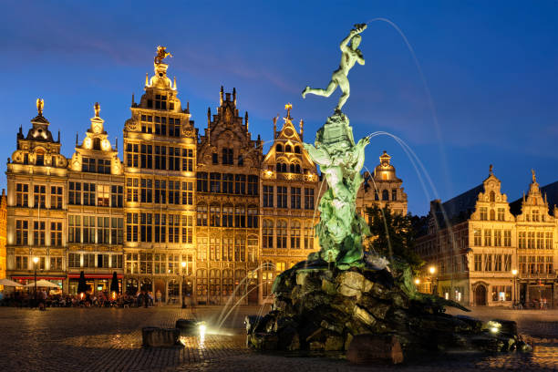 Antwerp Grote Markt with famous Brabo statue and fountain at night, Belgium stock photo