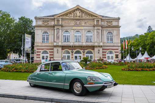 Baden-Baden, Germany - 14 July 2019: light green Citroen DS 21 DS23 Pallas coupe 1968 1976 is parked in Kurpark in Baden-Baden at the exhibition of old cars 
