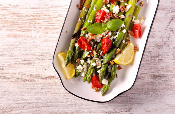 istock Asparagus, feta, tomato salad 1440955494