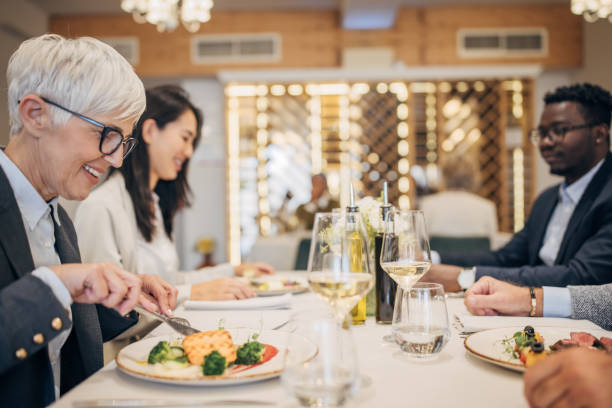 istock People on lunch in restaurant 1440956484