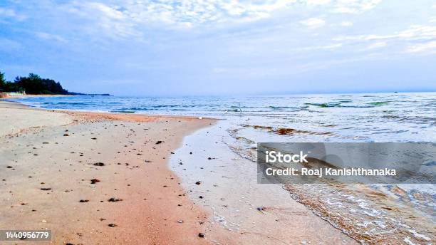 Beautiful Natural Golden Sand Beach Sunrise Fresh Sea Breeze Summer Vacation Blue Sky And White Clouds Stock Photo - Download Image Now