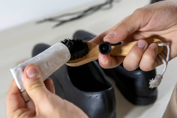 istock Polishing shoes 1440959971