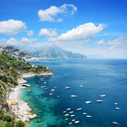 Wide angle view of the Amalfi Coast at sunny day, Campania, Italy. Composite photo