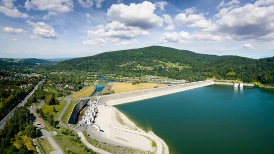 Vacations in Poland - view from the drone of  Lake Mucharskie with water dam on the Skawa river in Beskidy Mountains, Swinna Poreba in Malopolska province