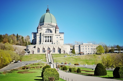 A mesmerizing shot of the St Joseph Oratory of Mount Royal in Montreal, Canada on sunny day under blue sky