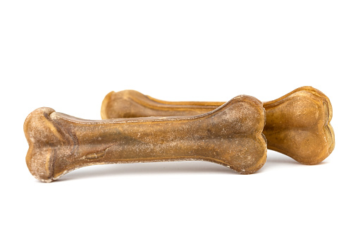 the brown rawhide pressed dog bones