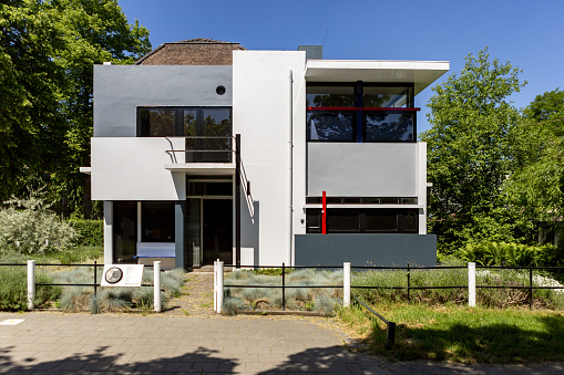 Utrecht, Netherlands – June 14, 2021: Historic and iconic home architecture building bathing in sunlight designed by Gerrit Rietveld in 1923