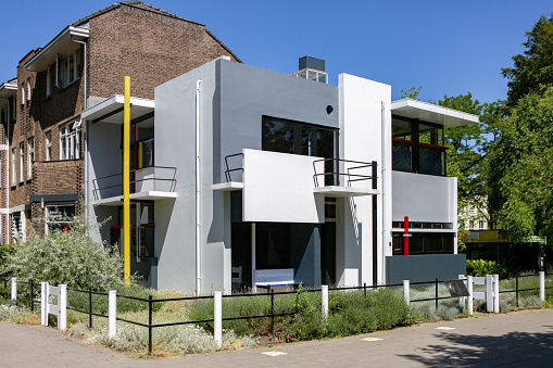 Utrecht, Netherlands – June 14, 2021: Historic and iconic home architecture of Rietveld-Schroderhuis building bathing in sunlight in city of Utrecht designed by Gerrit Rietveld in 1923