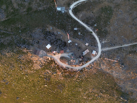 an aerial shot over a wind power plant sttaion