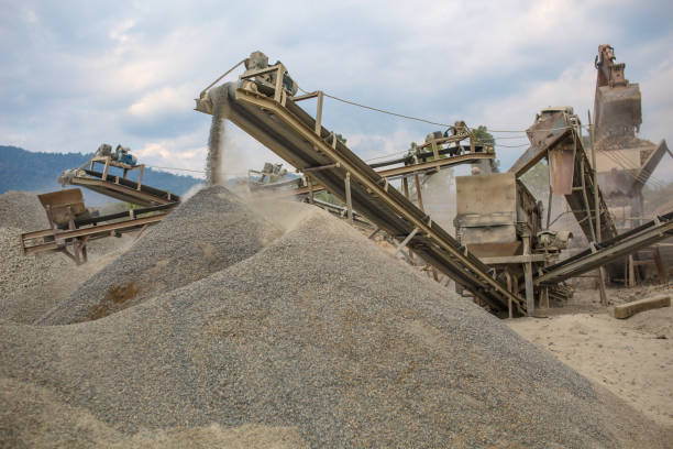 istock Heavy machinery works at a quarry 1440967370