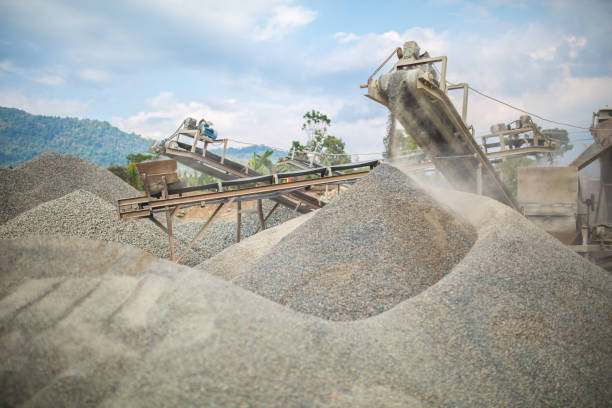 istock Heavy machinery works at a quarry 1440967425