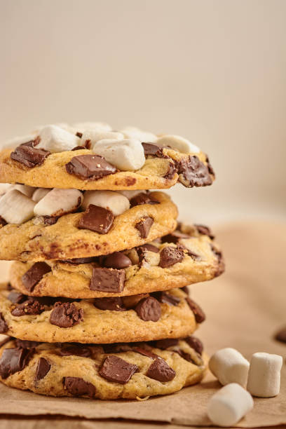 istock Vertical closeup of chocolate chip cookies with marshmallows. 1440967573