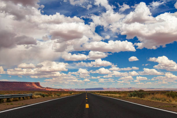 istock Highway through the deserts under the cloudy sky 1440967964