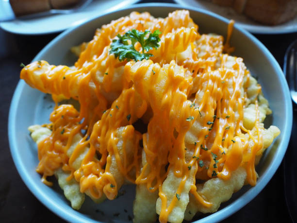 istock French fries topped with cheese 1440968841