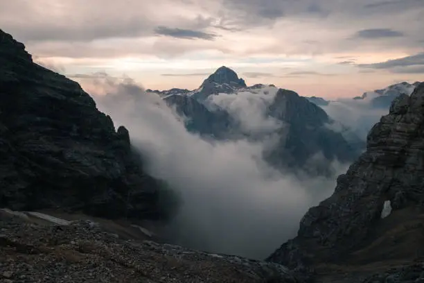 Photo of Scenic view of the Triglav mountain in Slovenia enveloped in fog