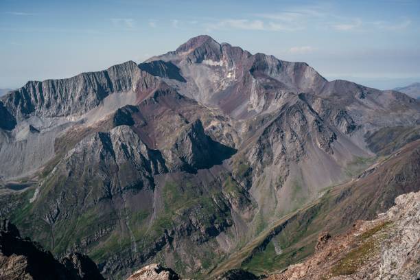 istock Rocky mountains under a sunny sky 1440971794
