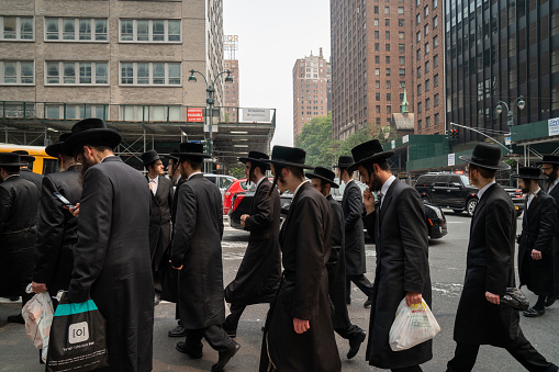 New York, United States – July 21, 2021: Ultra-Orthodox Jews protest against Israeli government policies outside the Israeli consulate in New York City.