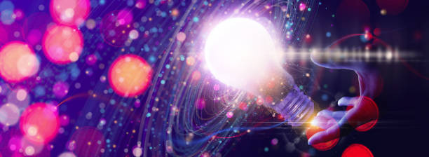 istock Business woman hand touching lightbulb Introduction of artificial intelligence. Big Data concept.Digital neural network.Cyberspace of future.Science and innovation of technology. 1440972817