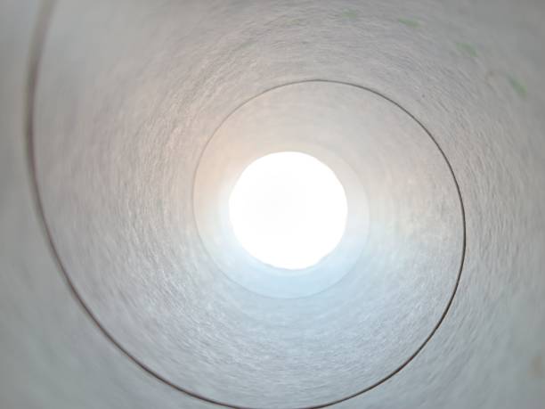 istock Bright light view through a tube, In cardboard 1440973094