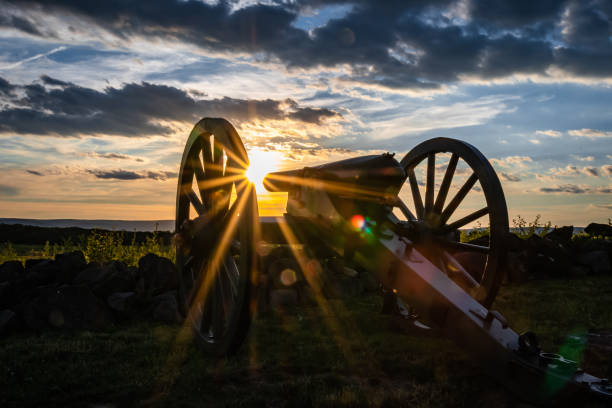 istock Old cannon on a filed at sunset 1440974535