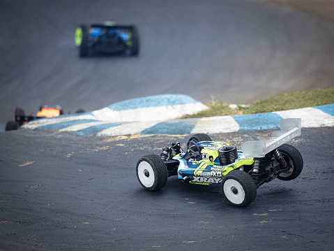 Montpell, France – February 14, 2022: A racing radio-controlled buggy on the road, France