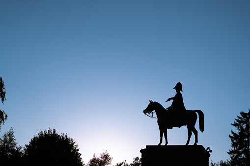 Aldershot, United Kingdom – February 19, 2022: Duke of Wellington Statue shot at twilight as a silhouette