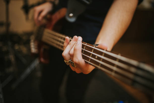 istock Closeup of a musician playing guitar 1440975762
