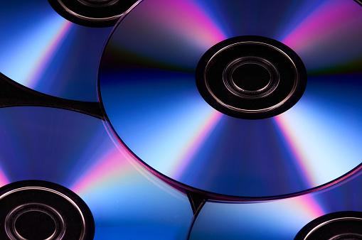 A closeup of the shiny, colorful dvd discs