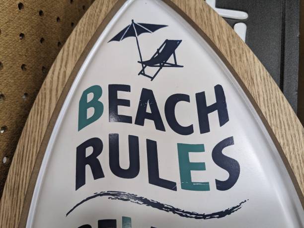 istock Closeup shot of a beach rules signage 1440976776