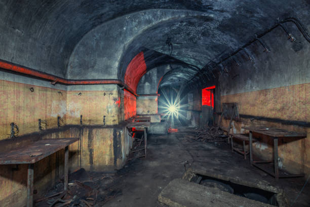 istock Exploration of an old bunker from the second world war with a flashlight 1440977725