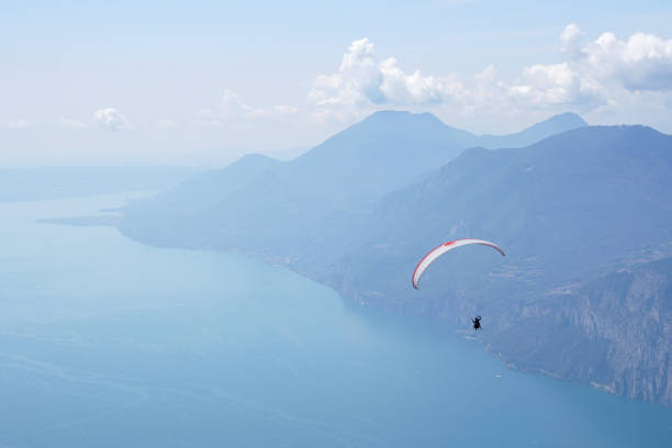 istock Paragliding over Malcesnie town on Lake Garda 1440977847