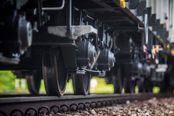 istock Close-up on a Train Car Undercarriage, passenger train, freight train 1440978971