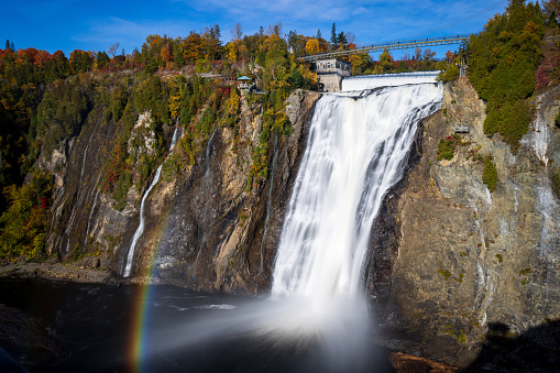 Momorency Falls flows into the St. Lawrence River near Orléan Island