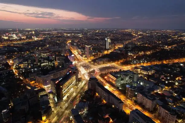 An aerial view of cityscape in Bucharest, Romania at night