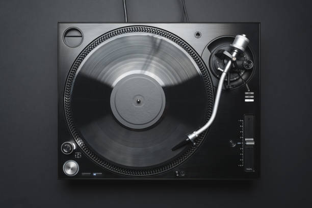 istock Dj turntable in flay lay. Turn table playing vinyl record with music. 1440981084